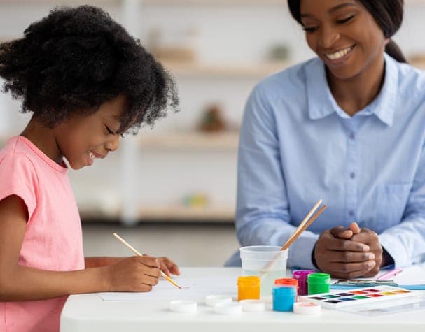 A therapist and a family working together